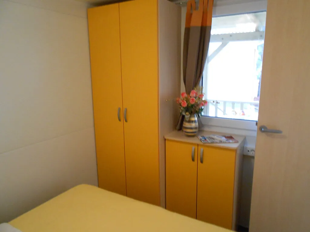 camping-kozarica-mobile-home-couple-wardrobe-2