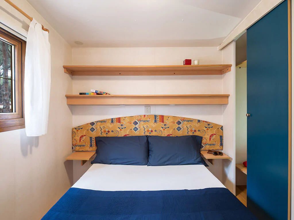 camping-village-baia-blu-la-tortuga-mobile-home-baia-comfort-bedroom