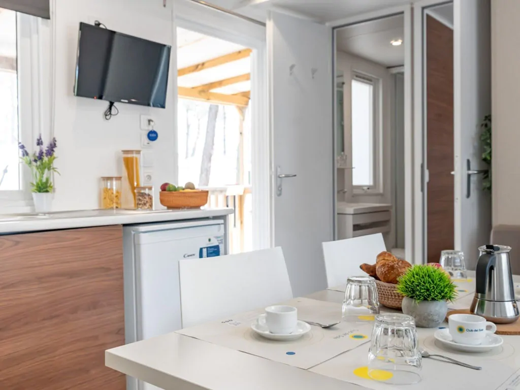 spina-family-collection-lodge-superior-interior-living-room-and-kitchen-view