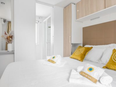 vigna-sul-mar-family-collection-lodge-superior-interior-bedroom-double-bed