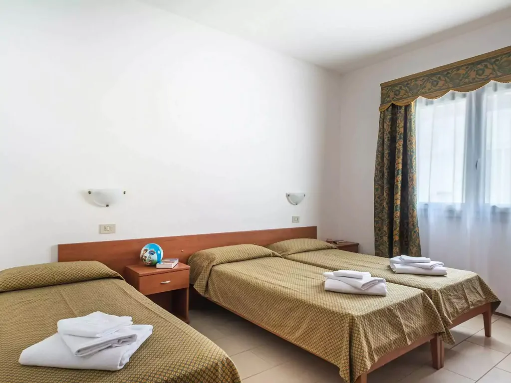 apartment-midi-villaggio-san-francesco-interior-single-beds-ii