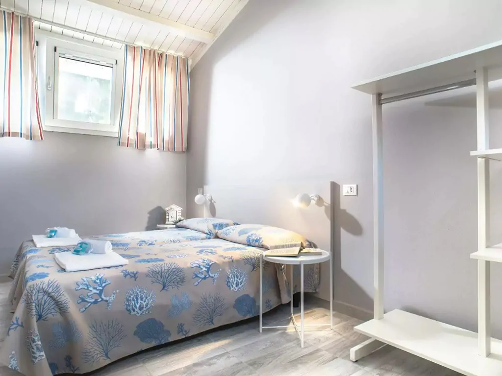 apartment-superior-villaggio-san-francesco-interior-double-beds-view