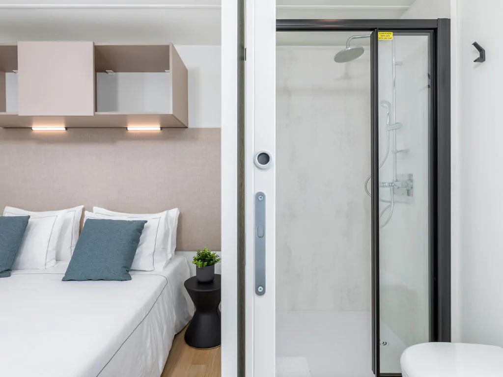 camping-arena-stupice-mobile-home-camping-home-interior-bedroom-and-bathroom-2