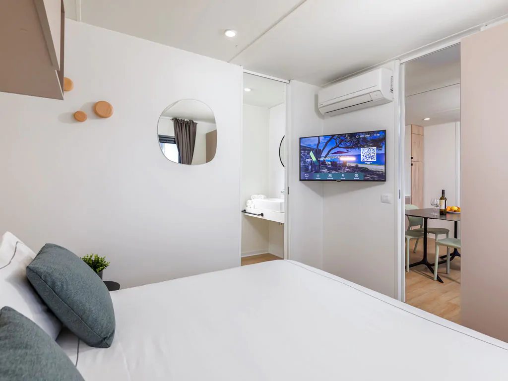 camping-arena-stupice-mobile-home-camping-home-interior-bedroom-double-bed-2