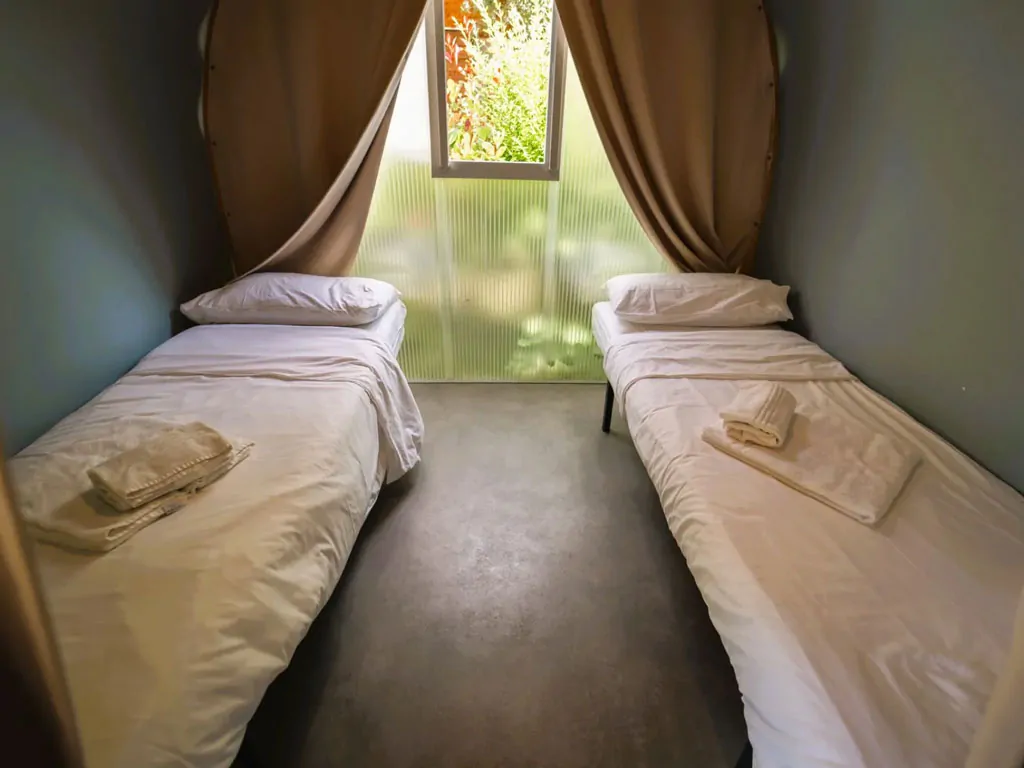 lago-idro-glamping-boutique-glamping-tent-coco-suite-interior-bedroom-single-beds
