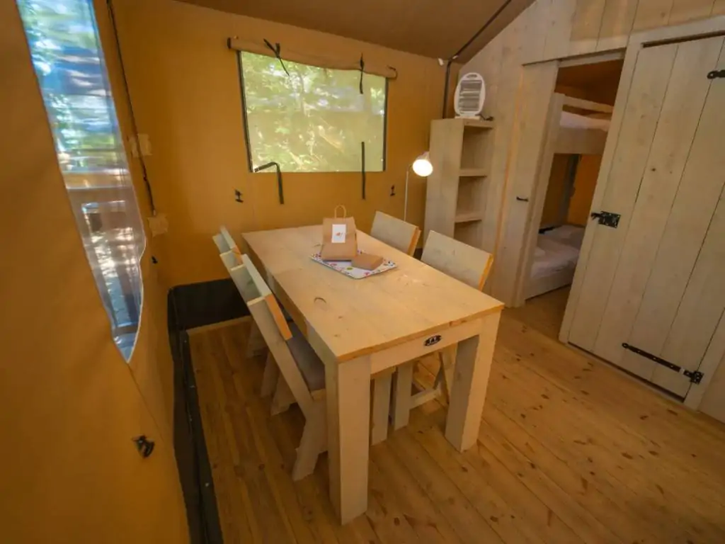 small-orlando-safari-tent-living-room-with-dining-table