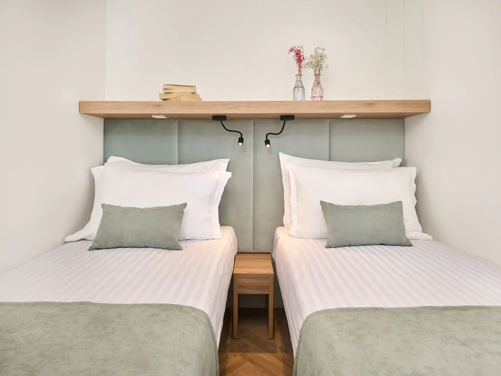 aminess-atea-camping-resort-luxury-glamping-villa-interior-bedroom-single-beds-view
