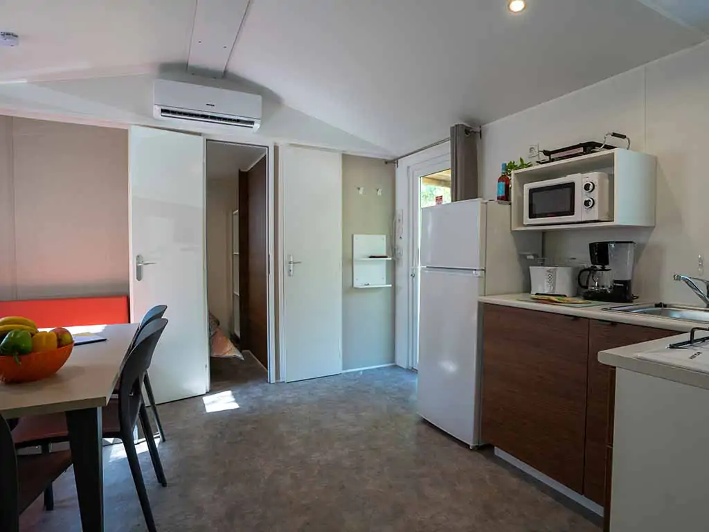 mobile-home-happy-premium-suite-interior-kitchen-and-dining-area