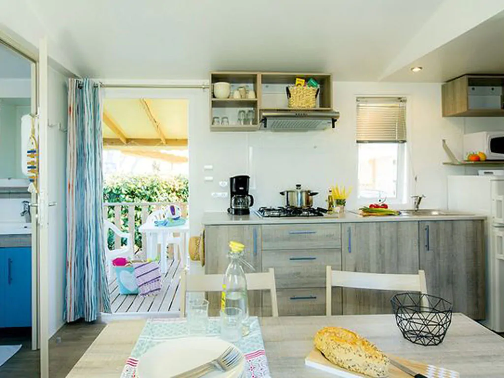 camping-rosapineta-mobile-home-comfort-interior-kitchen-and-living-room-view