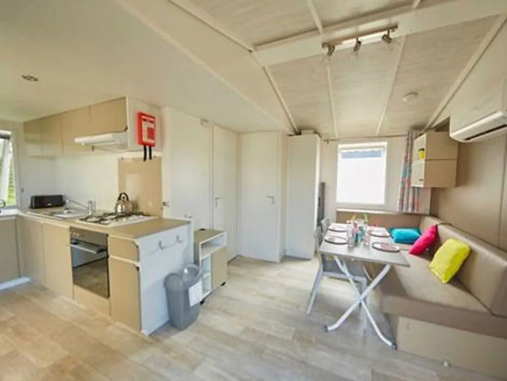 hu-girasole-village-mobile-home-comfort-for-4-persons-interior-kitchen-and-living-room