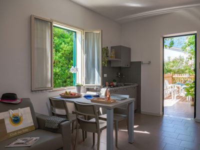 stork-family-collection-bungalow-bilocale-dog-interior-dining-room-view