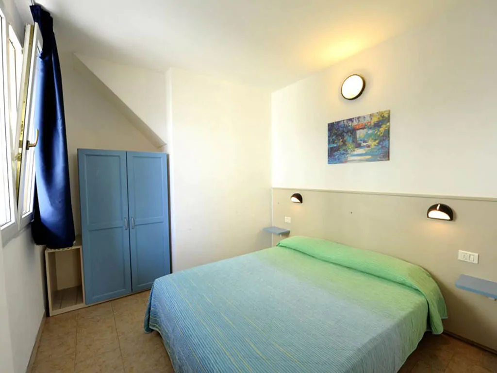 campsite-bella-italia-apartment-primula-interier-bedroom