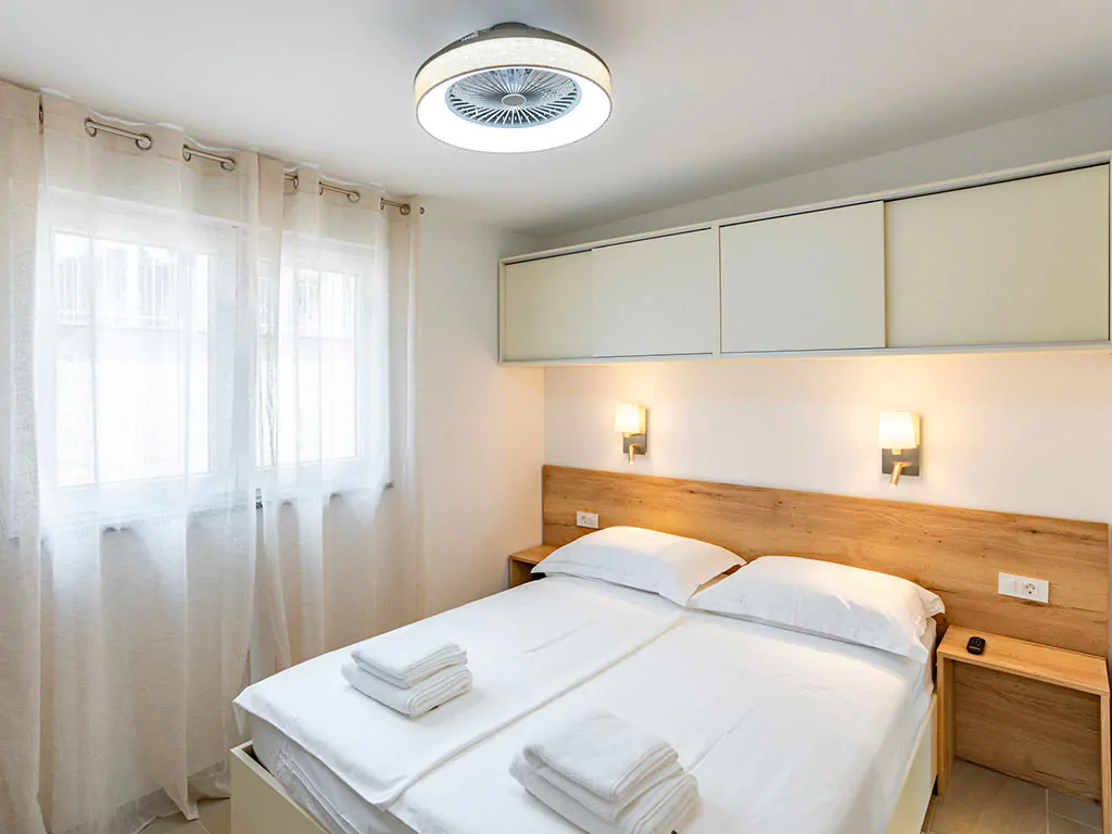 camping-arti-homes-rab-mobile-home-arti-studio-three-interior-bedroom-double-bed