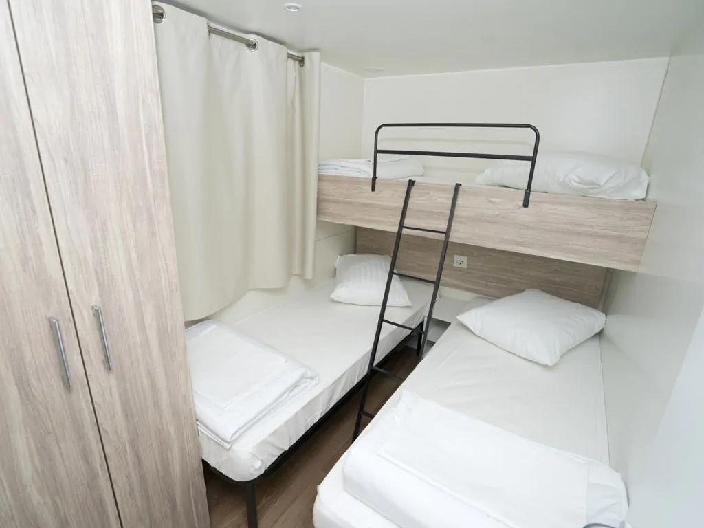 campsite-kovacine-mobile-home-family-plus-interior-bedroom-single-beds