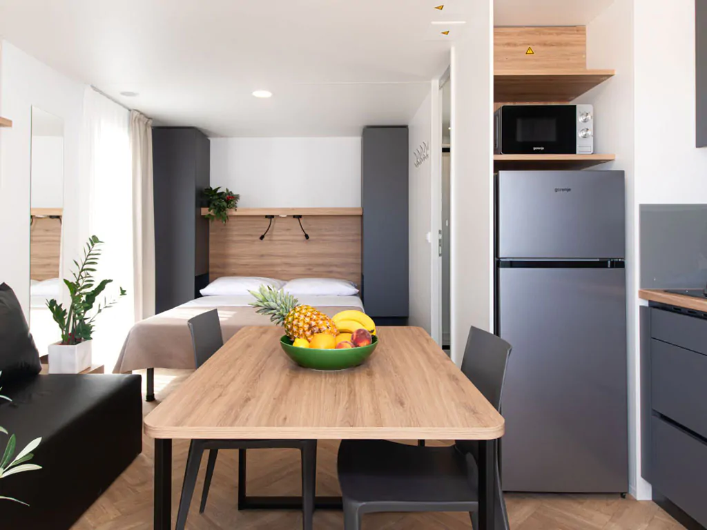 camping-resort-sibenik-mobile-home-c-interior-livingroom-table